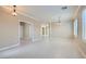 Spacious living room with tile flooring, neutral walls, and ample natural light at 2668 Ivoryhill St, Las Vegas, NV 89135
