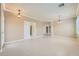 Bright living area with neutral paint, recessed lighting, and an arched doorway at 2668 Ivoryhill St, Las Vegas, NV 89135