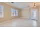 Inviting room featuring tile floors, neutral walls, and shuttered windows at 2668 Ivoryhill St, Las Vegas, NV 89135