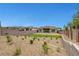 Expansive backyard featuring low-maintenance landscaping and views of surrounding homes at 281 Gandara St, Las Vegas, NV 89138