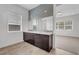 This modern bathroom has a dual sink vanity and lots of storage at 281 Gandara St, Las Vegas, NV 89138