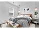 Comfortable bedroom with neutral tones, natural light, and minimalist decor at 281 Gandara St, Las Vegas, NV 89138