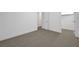 Bedroom showcasing neutral carpet, white walls and access to closet at 281 Gandara St, Las Vegas, NV 89138