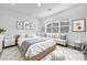 Bright bedroom with a cozy window seat and minimalist decor at 281 Gandara St, Las Vegas, NV 89138