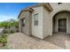 Inviting front entrance featuring stone accents, brick pavers, and a well-manicured landscape at 281 Gandara St, Las Vegas, NV 89138