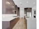 Contemporary kitchen with modern appliances, white countertops, and sleek cabinetry at 281 Gandara St, Las Vegas, NV 89138