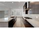 Bright kitchen with a large center island, stainless steel appliances, and modern lighting at 281 Gandara St, Las Vegas, NV 89138