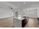 Open-concept kitchen with a large island, stainless steel appliances, and recessed lighting at 281 Gandara St, Las Vegas, NV 89138