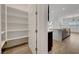 Walk-in pantry with shelving and ample storage space, conveniently located near the kitchen at 281 Gandara St, Las Vegas, NV 89138