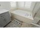 Stylish bathroom features a soaking tub and separate glass shower, with neutral finishes at 29 Blue Valley Dr, Henderson, NV 89002
