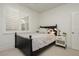 Cozy bedroom with plantation shutters, modern decor, and comfortable dark-wood bed at 29 Blue Valley Dr, Henderson, NV 89002