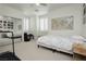 Well-lit bedroom with a mirrored closet, comfy bed, and stylish wall art at 29 Blue Valley Dr, Henderson, NV 89002