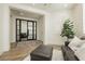 Stylish entryway featuring modern doors, wood flooring, and neutral decor at 29 Blue Valley Dr, Henderson, NV 89002