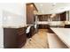 Gourmet kitchen with granite countertops, ample cabinetry, and modern stainless steel appliances at 29 Blue Valley Dr, Henderson, NV 89002