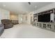Comfortable living room featuring a large media center and open floor plan at 29 Blue Valley Dr, Henderson, NV 89002