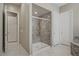 Modern bathroom features a walk-in shower with decorative stone surround at 3155 Dalmazia Ave, Henderson, NV 89044