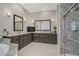 Bathroom showcases double vanity, granite countertops, and decorative framed mirrors at 3155 Dalmazia Ave, Henderson, NV 89044