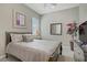Relaxing bedroom featuring neutral colors and natural light at 3155 Dalmazia Ave, Henderson, NV 89044