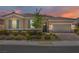 Charming single-story home with well-manicured landscaping and inviting curb appeal at 3155 Dalmazia Ave, Henderson, NV 89044