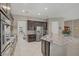 A gourmet kitchen featuring stainless appliances, a large island and gorgeous countertops at 3155 Dalmazia Ave, Henderson, NV 89044