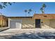 Exterior view showcasing the home's facade, garage, and secure gated entry at 3310 Heritage Pl, Las Vegas, NV 89121