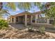 Attractive backyard featuring lush greenery, mature trees, and a tranquil outdoor space at 4227 Pacifico Ln, Las Vegas, NV 89135