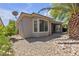 Lovely backyard featuring lush greenery, mature trees, and a tranquil outdoor space at 4227 Pacifico Ln, Las Vegas, NV 89135