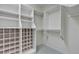 Walk-in closet featuring custom shelving for organized storage of shoes, clothes, and accessories at 4227 Pacifico Ln, Las Vegas, NV 89135