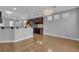 Kitchen area with wood cabinetry, pendant lighting, and breakfast bar at 4227 Pacifico Ln, Las Vegas, NV 89135