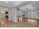 Open-concept living room with fireplace, hardwood flooring, and recessed lighting at 4227 Pacifico Ln, Las Vegas, NV 89135