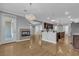 Spacious living area with hardwood floors, fireplace, and open layout at 4227 Pacifico Ln, Las Vegas, NV 89135