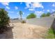 Spacious desert backyard with privacy wall and flowering oleander bushes at 4336 Desert Dancer Way, Las Vegas, NV 89147