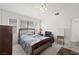 Bright bedroom with carpet floors, ceiling fan, and generous natural light at 4336 Desert Dancer Way, Las Vegas, NV 89147