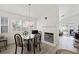 Bright dining area with fireplace and modern laminate flooring at 4336 Desert Dancer Way, Las Vegas, NV 89147