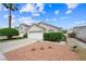 Charming single-story home featuring a well-maintained front yard and a two-car garage at 4336 Desert Dancer Way, Las Vegas, NV 89147