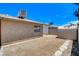View of the backyard, showcasing the home's exterior, landscaping, and storage shed at 4533 Diamond Head Dr, Las Vegas, NV 89110