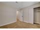This bedroom boasts neutral walls, tan carpet, and a closet with sliding doors at 4533 Diamond Head Dr, Las Vegas, NV 89110