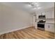 Kitchen area boasts stainless steel appliances and bright white cabinets at 4533 Diamond Head Dr, Las Vegas, NV 89110