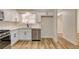 Modern kitchen featuring stainless steel appliances and white cabinetry at 4533 Diamond Head Dr, Las Vegas, NV 89110