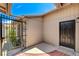 Enclosed courtyard features decorative tile flooring and wrought iron gate at 4533 Diamond Head Dr, Las Vegas, NV 89110