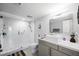 Contemporary bathroom boasts a walk-in shower with glass door and a modern vanity with clean lines at 5125 Turnberry Ln, Las Vegas, NV 89113