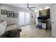 Bedroom with a cozy seating area, workspace, and a view of the outdoor patio at 5125 Turnberry Ln, Las Vegas, NV 89113