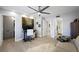 Bright room offers a functional workspace, additional storage and access to an ensuite bathroom at 5125 Turnberry Ln, Las Vegas, NV 89113