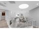 Bright interior showcasing an open floor plan with modern staircase and views of the living spaces at 5125 Turnberry Ln, Las Vegas, NV 89113