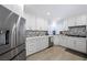 Modern kitchen featuring stainless steel appliances and stylish backsplash at 5125 Turnberry Ln, Las Vegas, NV 89113
