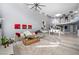 Spacious open-concept living area with high ceilings and modern decor, seamlessly connecting to the dining space at 5125 Turnberry Ln, Las Vegas, NV 89113