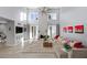 Bright living area featuring high ceilings, fireplace, and an open layout perfect for relaxation and entertaining at 5125 Turnberry Ln, Las Vegas, NV 89113
