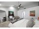 Bright bedroom featuring high ceilings, a ceiling fan, and contemporary furnishings at 5125 Turnberry Ln, Las Vegas, NV 89113