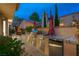 Well-lit outdoor kitchen featuring a built-in grill and stainless steel appliances at 5125 Turnberry Ln, Las Vegas, NV 89113