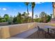 Outdoor patio showcasing lush landscaping and tall palm trees for a tropical vibe at 5125 Turnberry Ln, Las Vegas, NV 89113